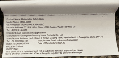 Label on the side of the recalled safety gate