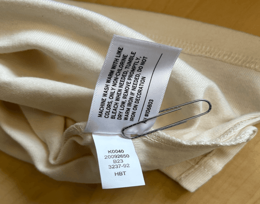 HBT, "CRE," "CBV" or "MNG" is printed on the pajama's side-seam label