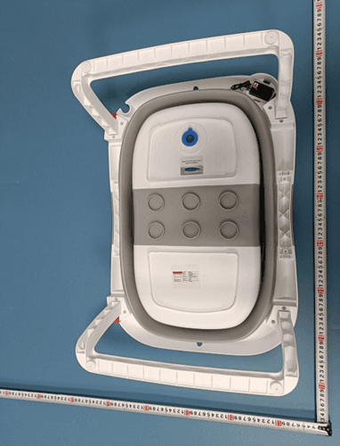 Bottom view of the Recalled Napei Collapsible Infant Bath Tub showing location of battery compartment